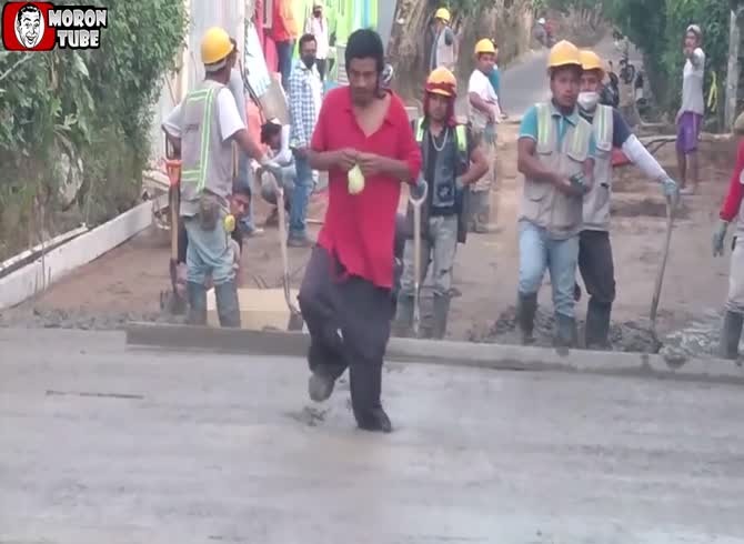 Video :Workers who had just poured fresh concrete have their labor ruined by a drug addict